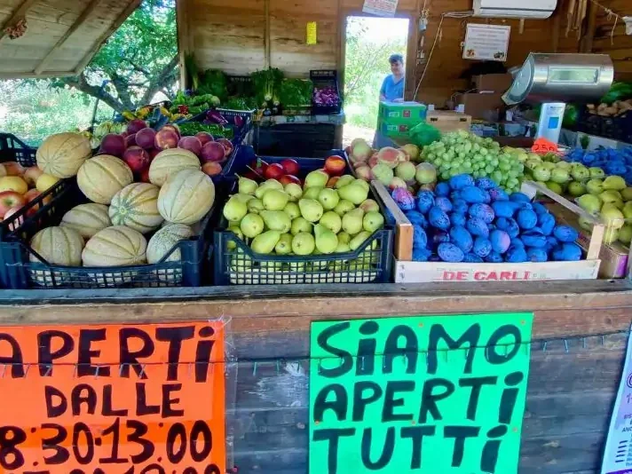 At the market buying fresh vegetables in Toscana