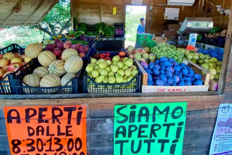 At the market buying fresh vegetables in Toscana