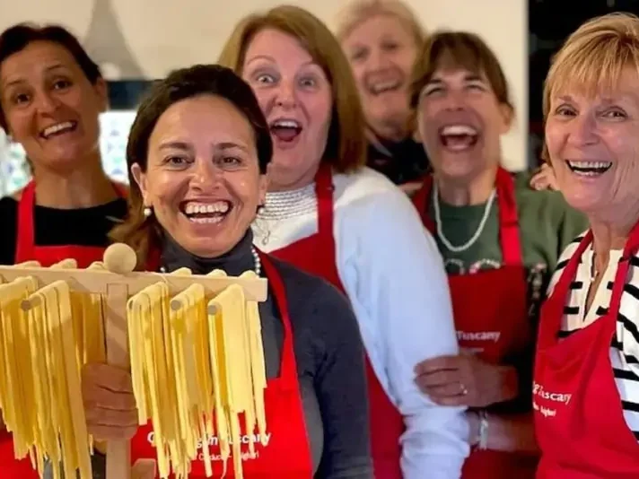 Chicca and guests making homemade pasta at home in La Casa Toscana