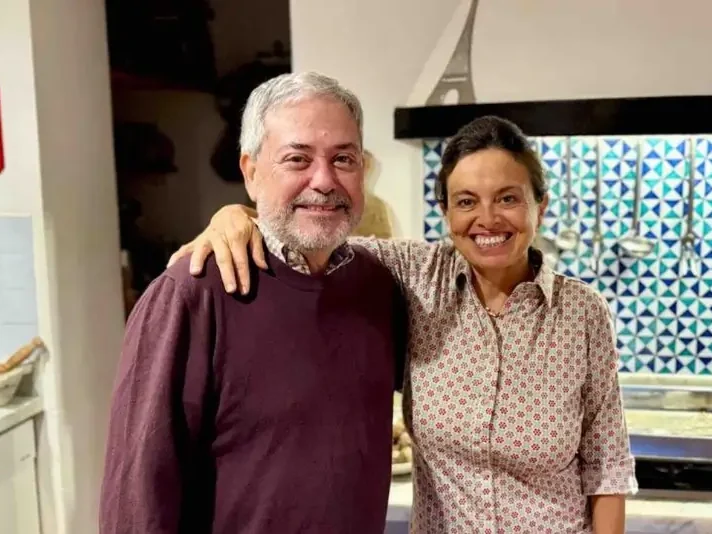 Guest with Chicca in the kitchen at La Casa Toscana