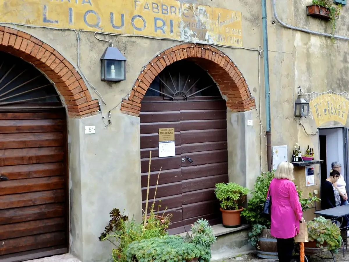 Visiting a local spirit maker in a small village in Bolgheri Tuscany